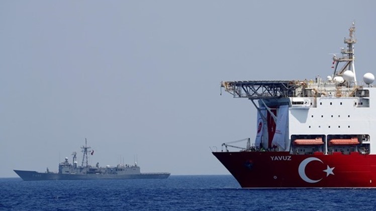 FILE PHOTO: Turkish drilling vessel Yavuz is escorted by Turkish Navy frigate TCG Gemlik (F-492) in the eastern Mediterranean Sea off Cyprus, August 6, 2019. REUTERS/Murad Sezer
